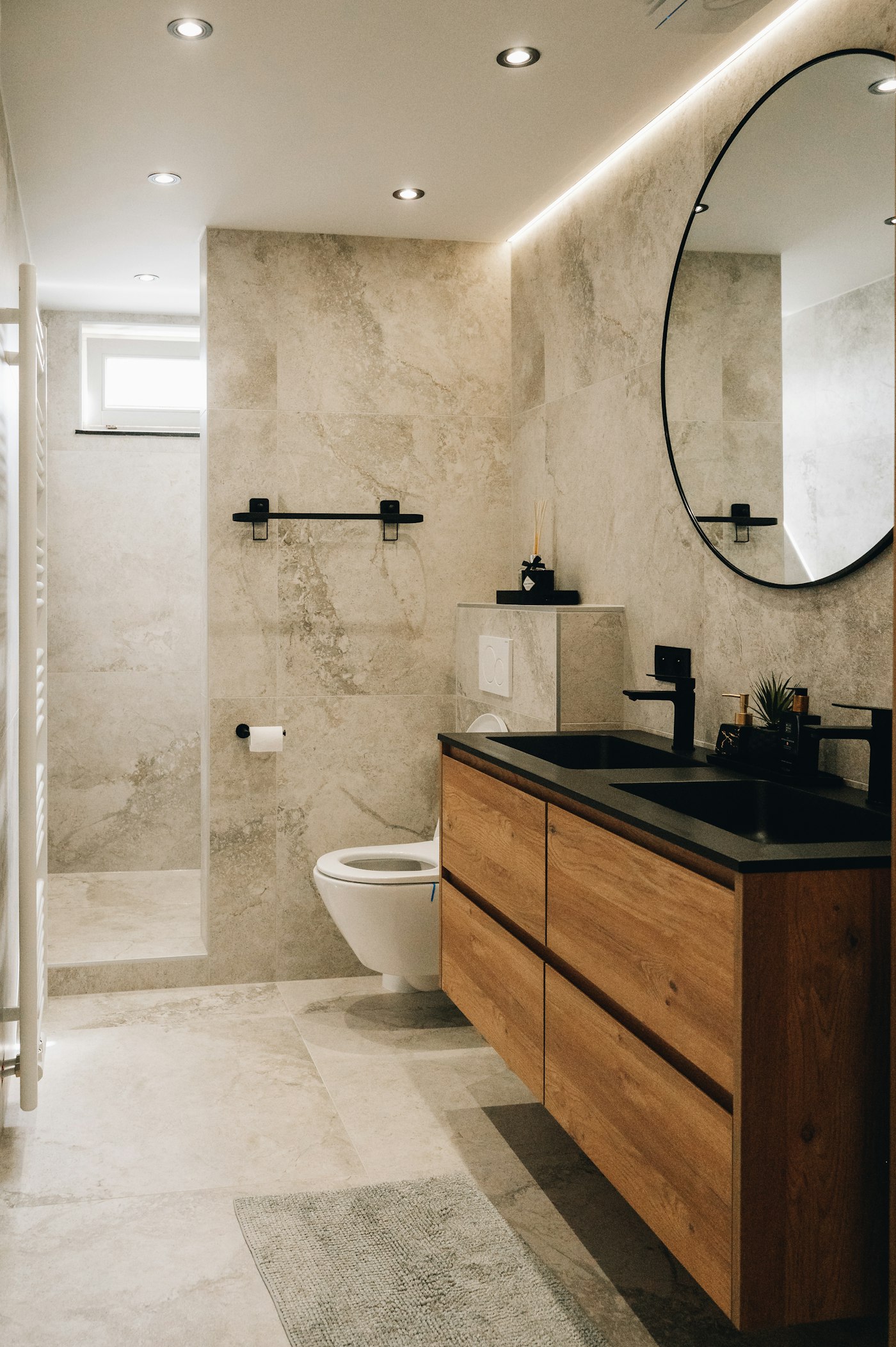 Salle de bains rénovée par ADM Sanitaire et Chauffage Sàrl